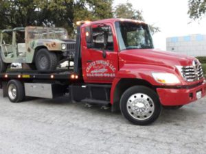 What is the maximum towing capacity for a flatbed tow truck?