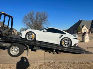 Chavez Towing Truck Loading White Sports Car
