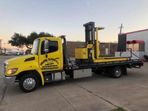 Yellow Chavez Towing Truck