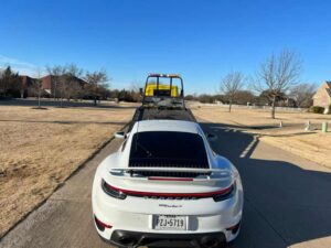 Chavez Towing Truck Loading White Porsche Car